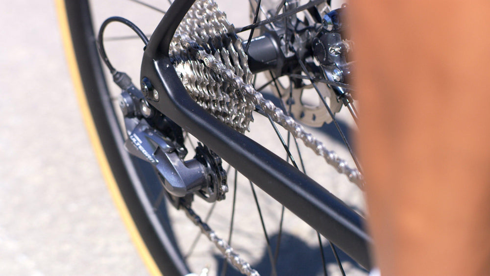 Chain being cleaned and brushed before waxing Chain being cleaned and brushed before waxing